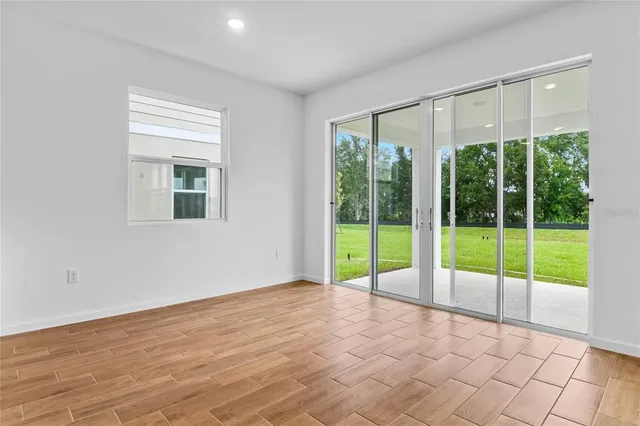 a view of an empty room and window