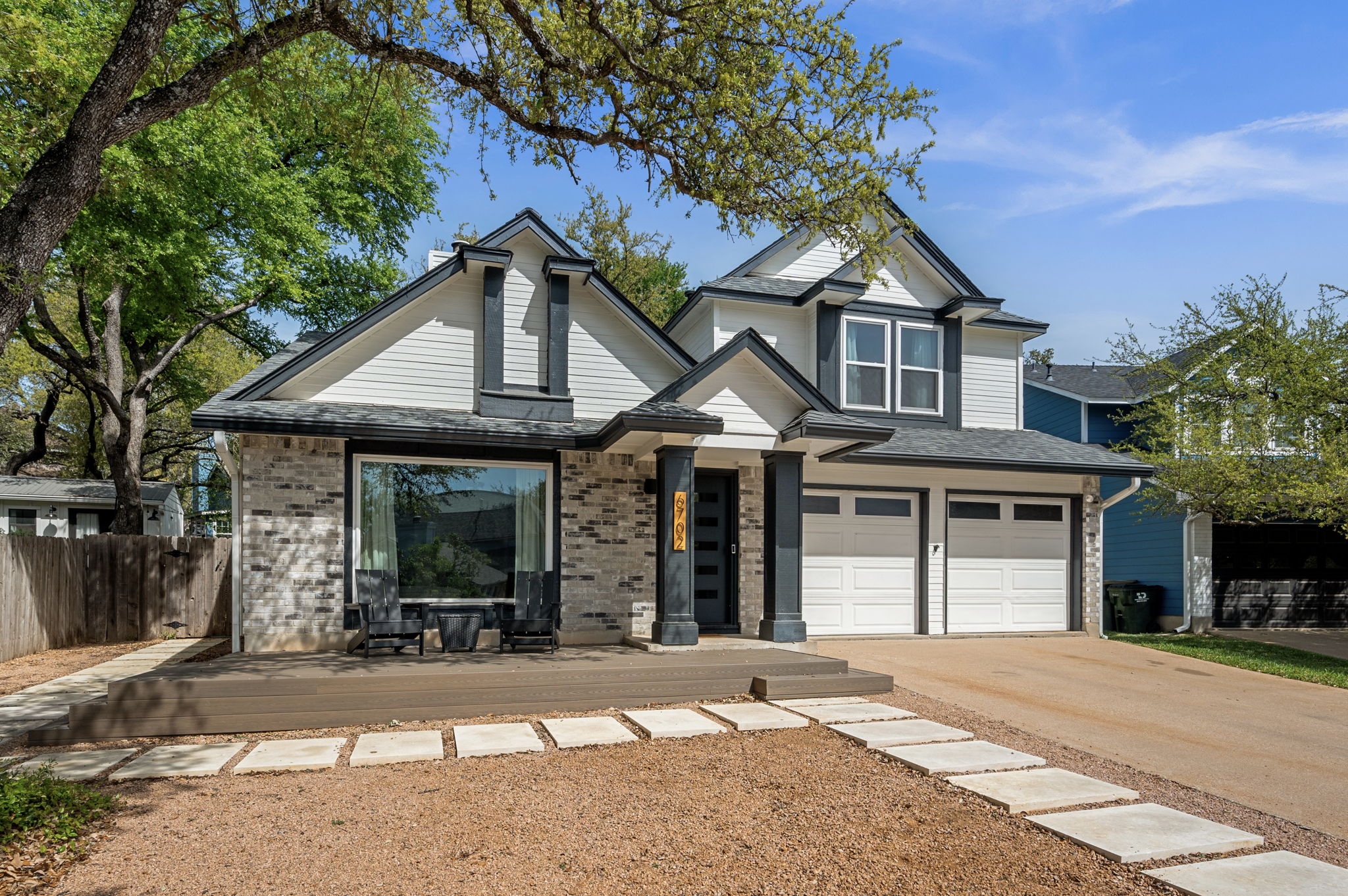 6702 Hondo Bend Austin, TX 78729 - Photo 1 of 1 a front view of a house with a yard