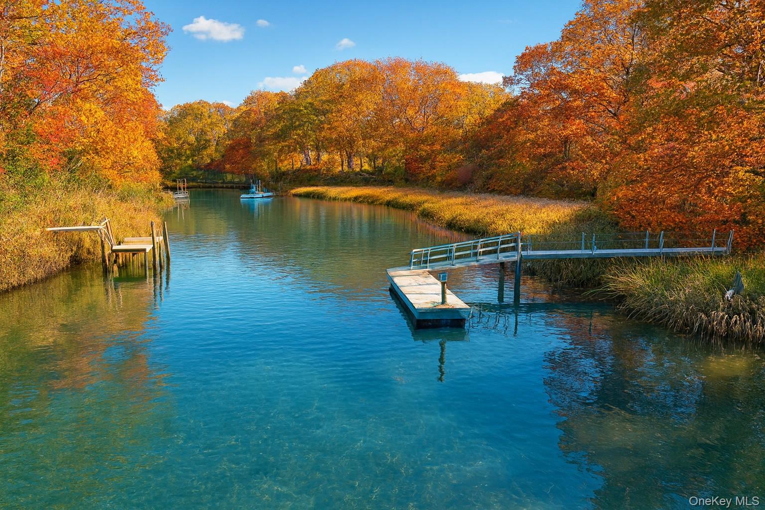 600 Glenn Road Southold, NY 11971 - Photo 2 of 22 a view of a lake with a mountain in the background