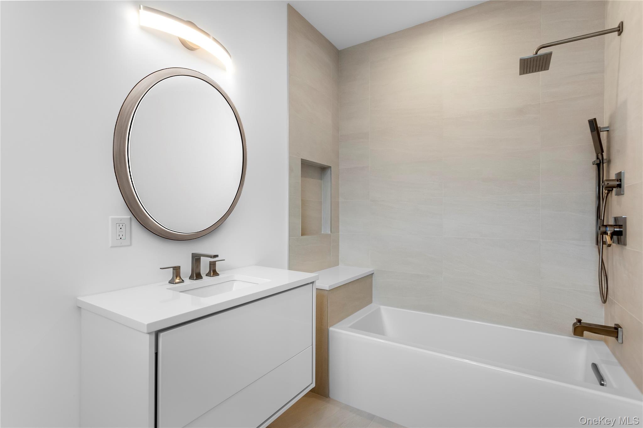 600 Glenn Road Southold, NY 11971 - Photo 22 of 22 a bathroom with a sink and a mirror