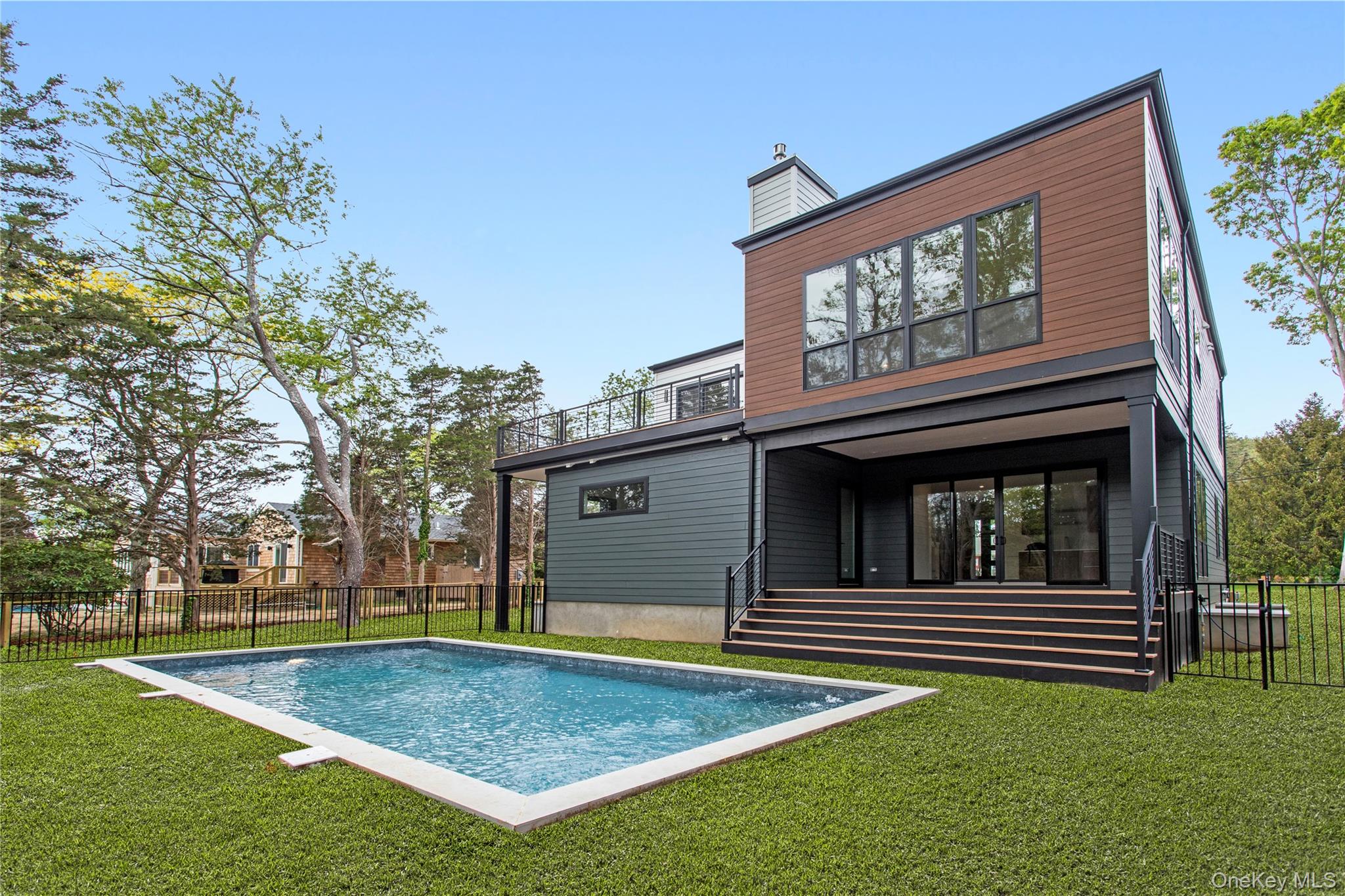 600 Glenn Road Southold, NY 11971 - Photo 4 of 22 a view of outdoor space yard deck and swimming pool