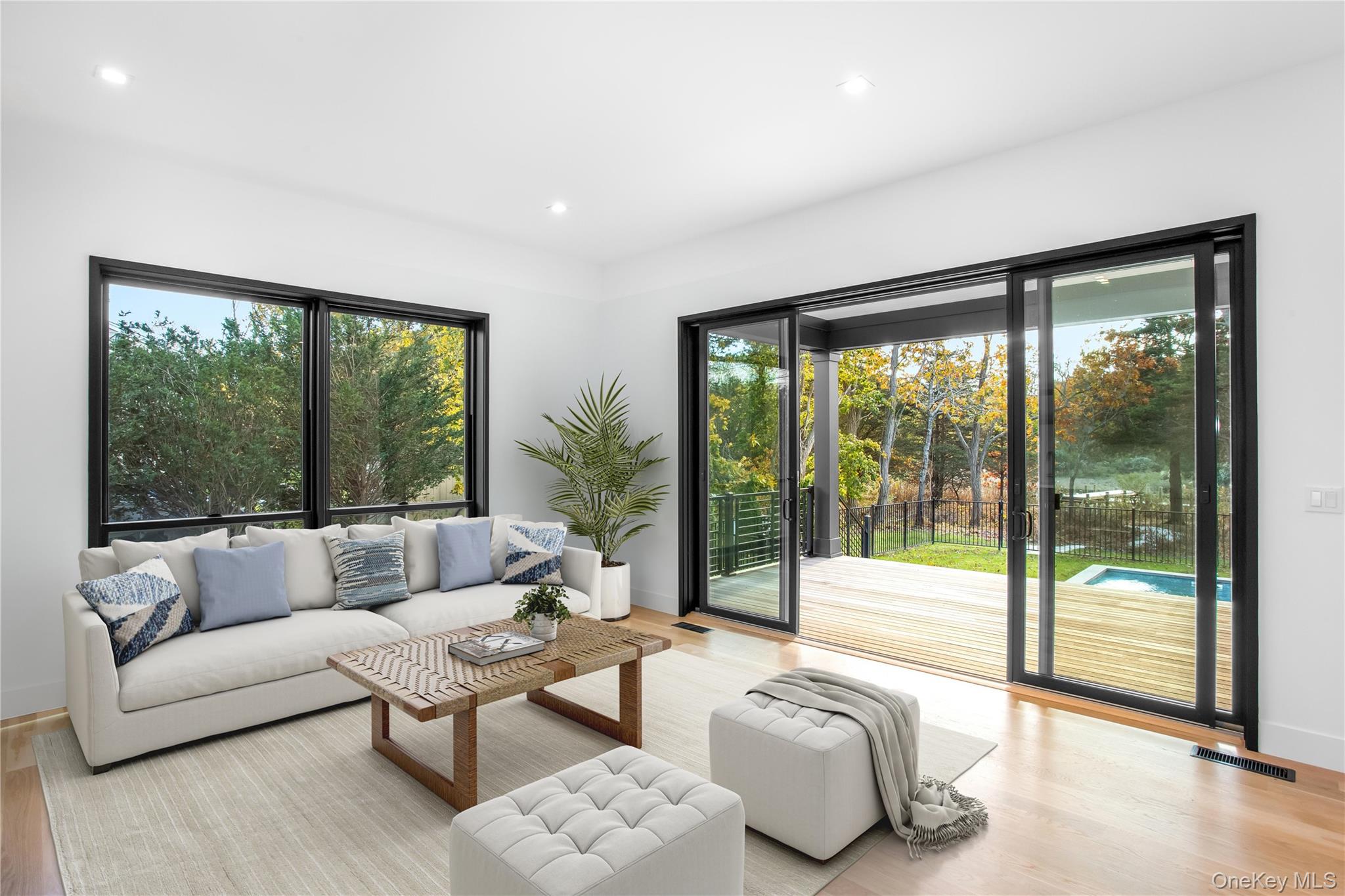 600 Glenn Road Southold, NY 11971 - Photo 8 of 22 a living room with furniture and a large window