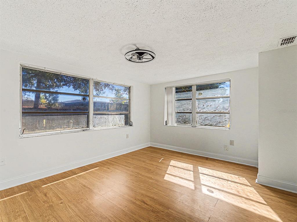 9430 Gray Fox Lane Port Richey, FL 34668 - Photo 20 of 33 a view of a room with window