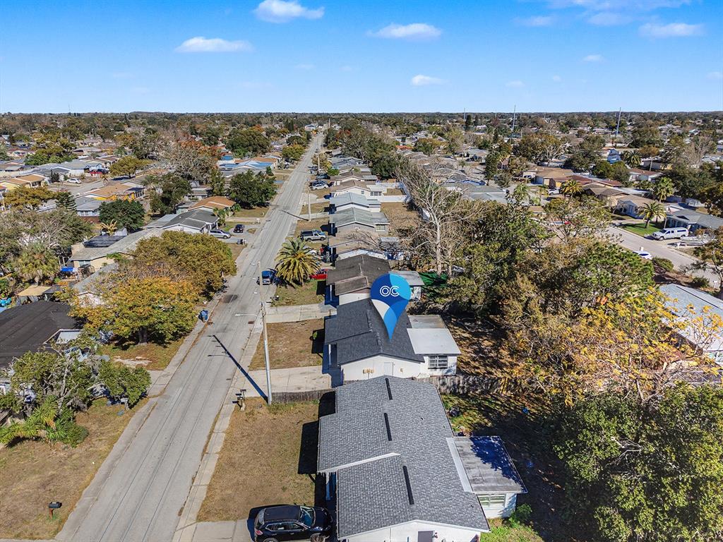 9430 Gray Fox Lane Port Richey, FL 34668 - Photo 30 of 33 an aerial view of house with yard