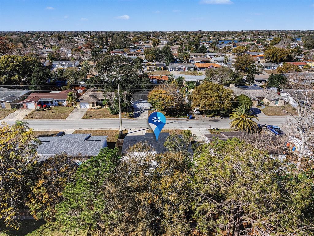 9430 Gray Fox Lane Port Richey, FL 34668 - Photo 31 of 33 an aerial view of a house with a yard