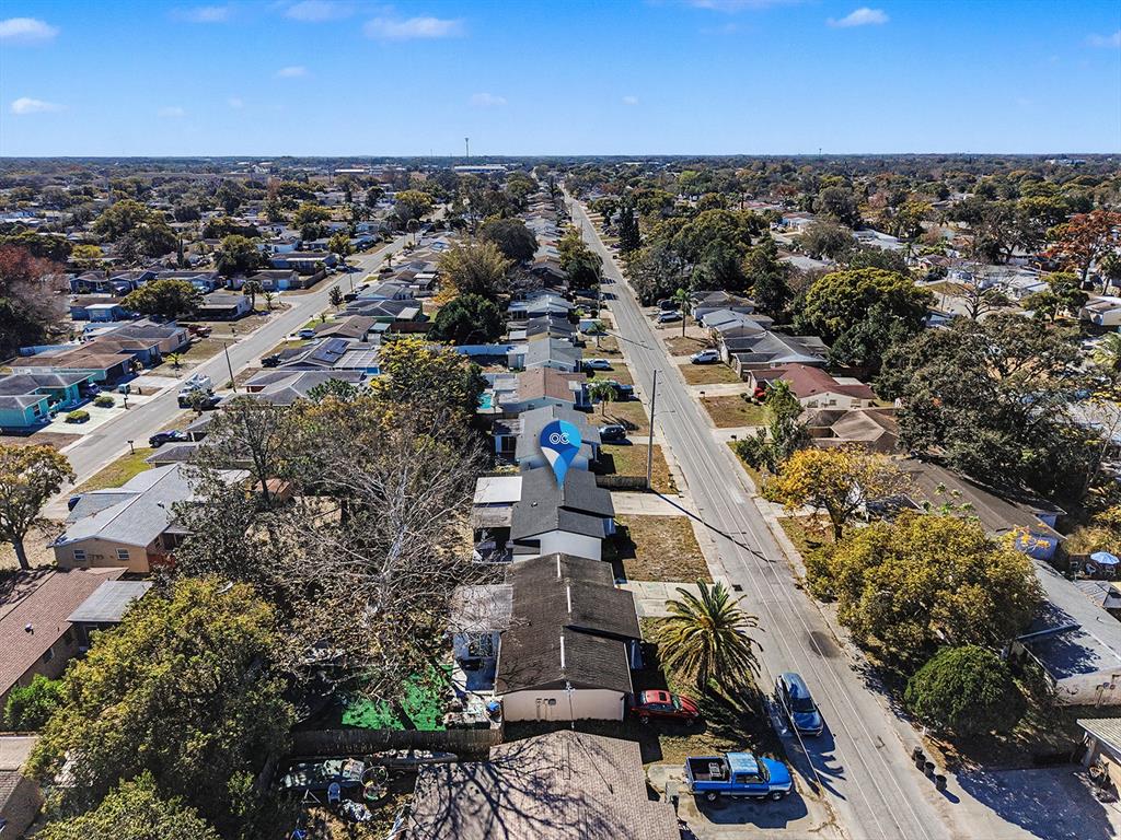 9430 Gray Fox Lane Port Richey, FL 34668 - Photo 33 of 33 an aerial view of residential houses with outdoor space