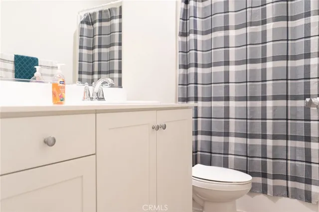 a bedroom with a bed and furniture