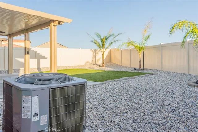 a view of swimming pool with a yard