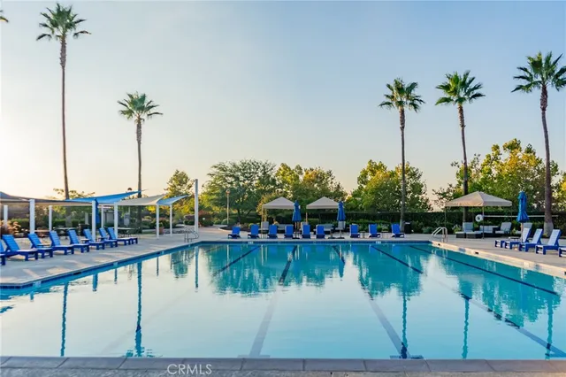 a view of a wooden deck with a backyard