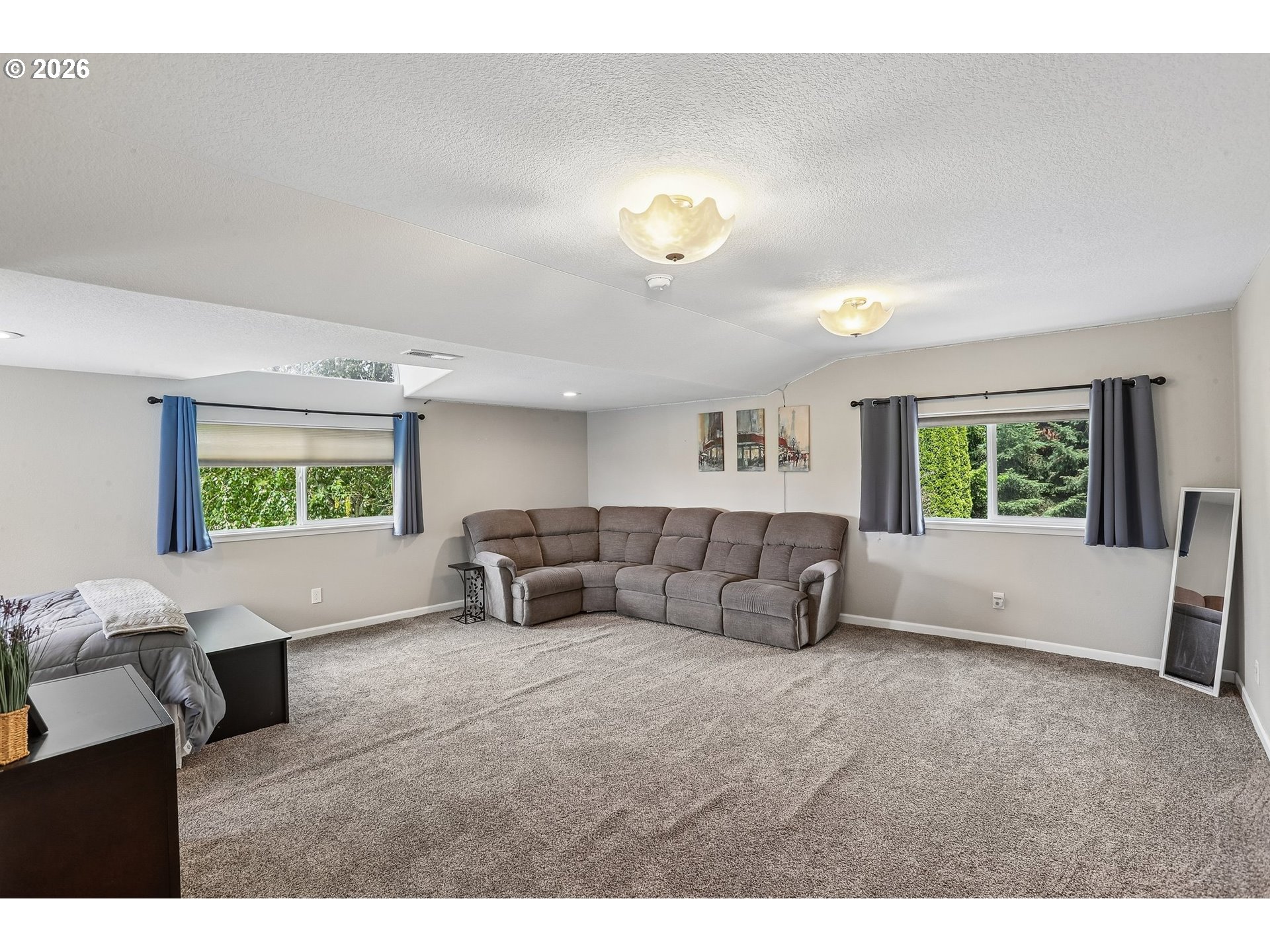 298 Roberson Road Woodland, WA 98674 - Photo 24 of 48 a living room with furniture and a large window
