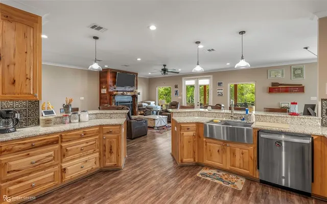 a kitchen with lots of counter top space and appliances