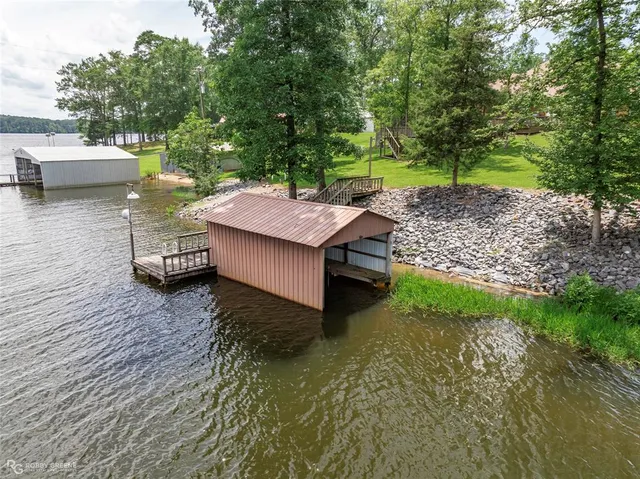 a view of a backyard with sitting area