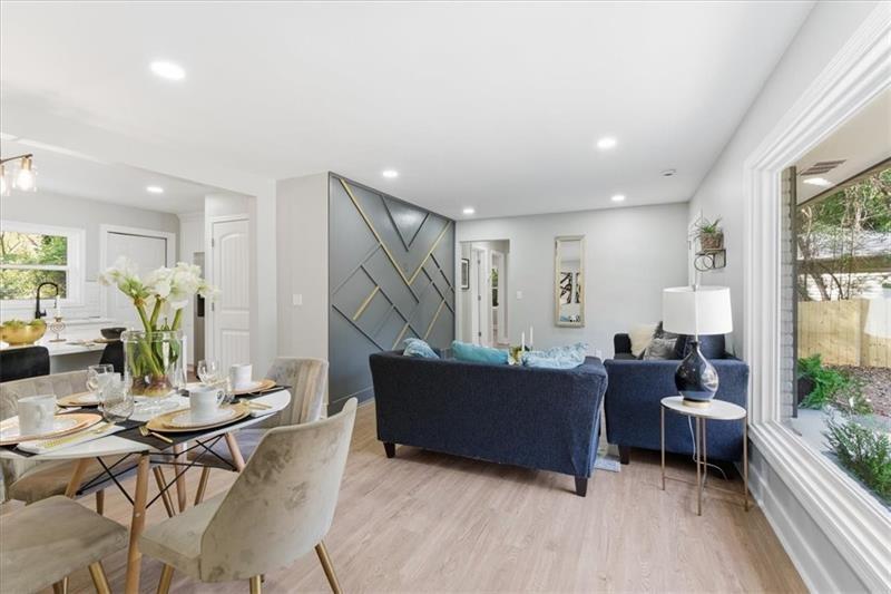 4015 Moffat Court Decatur, GA 30035 - Photo 11 of 34 a living room with furniture and a wooden floor