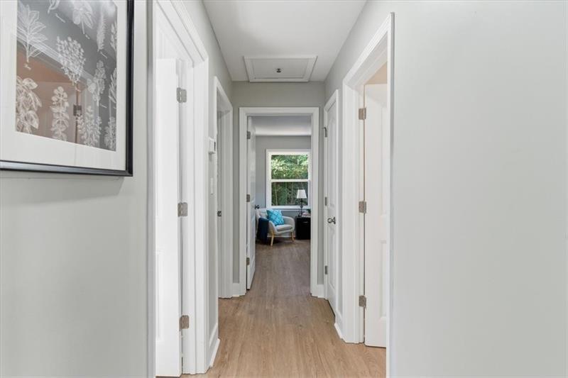 4015 Moffat Court Decatur, GA 30035 - Photo 13 of 34 a view of a hallway with wooden floor and closet