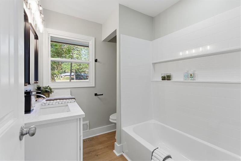 4015 Moffat Court Decatur, GA 30035 - Photo 21 of 34 a white bath tub sitting next to a white sink