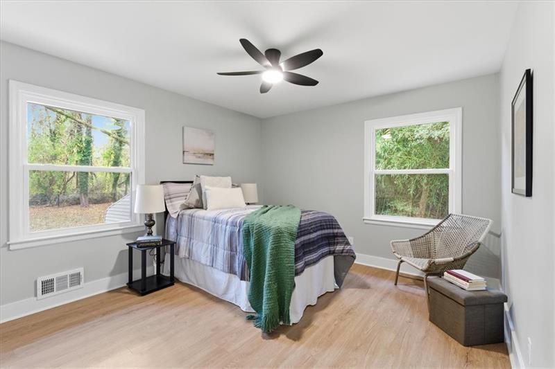 4015 Moffat Court Decatur, GA 30035 - Photo 22 of 34 a bed room with a bed and a chair