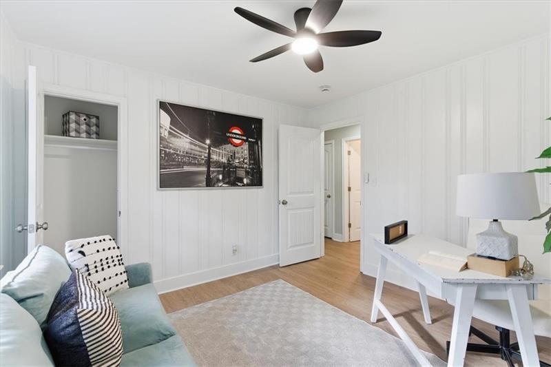 4015 Moffat Court Decatur, GA 30035 - Photo 24 of 34 a living room with furniture and a flat screen tv