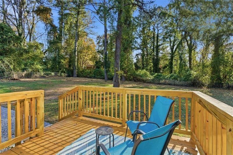 4015 Moffat Court Decatur, GA 30035 - Photo 27 of 34 a view of balcony with wooden floor and outdoor seating