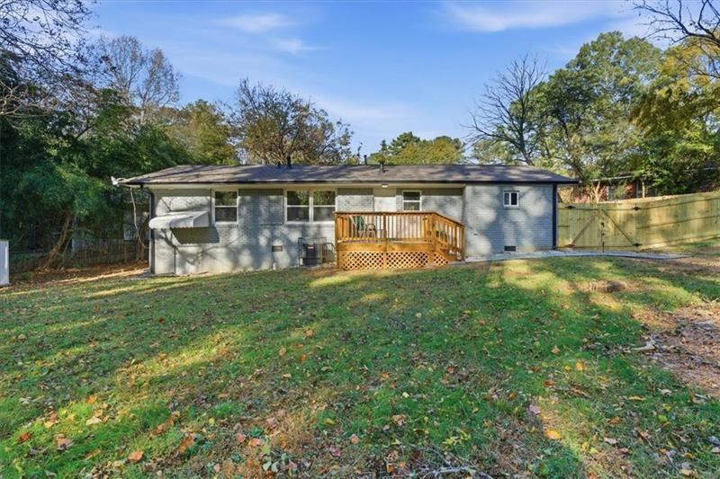 4015 Moffat Court Decatur, GA 30035 - Photo 29 of 34 a view of a house with backyard and a tree