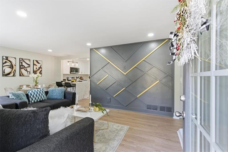 4015 Moffat Court Decatur, GA 30035 - Photo 3 of 34 a living room with furniture and a potted plant