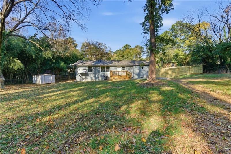4015 Moffat Court Decatur, GA 30035 - Photo 31 of 34 a swimming pool with wooden fence