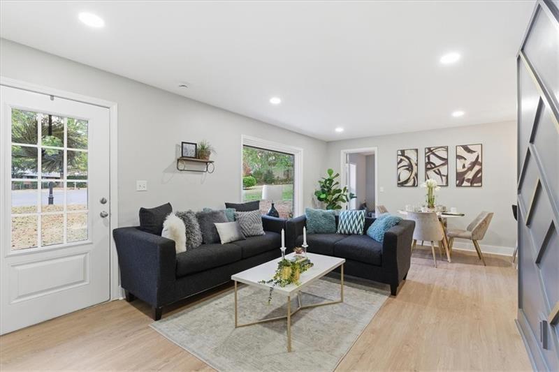 4015 Moffat Court Decatur, GA 30035 - Photo 4 of 34 a living room with furniture and a large window