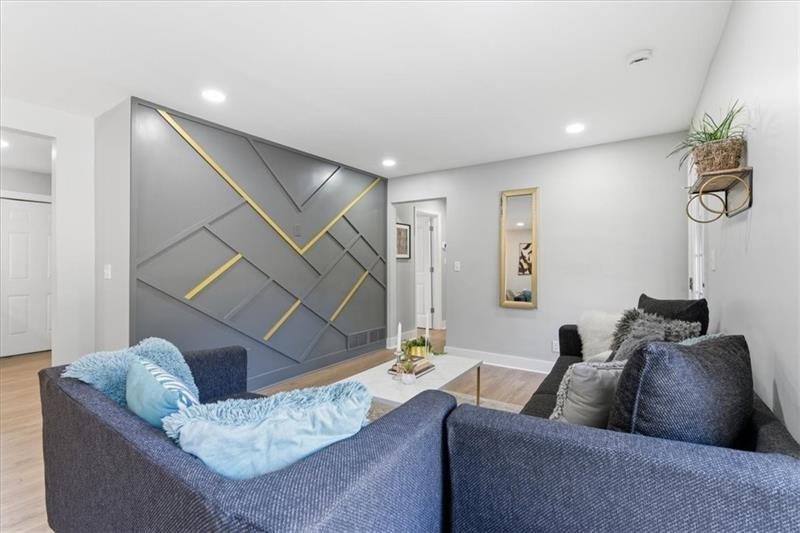 4015 Moffat Court Decatur, GA 30035 - Photo 5 of 34 a living room with furniture and a couch