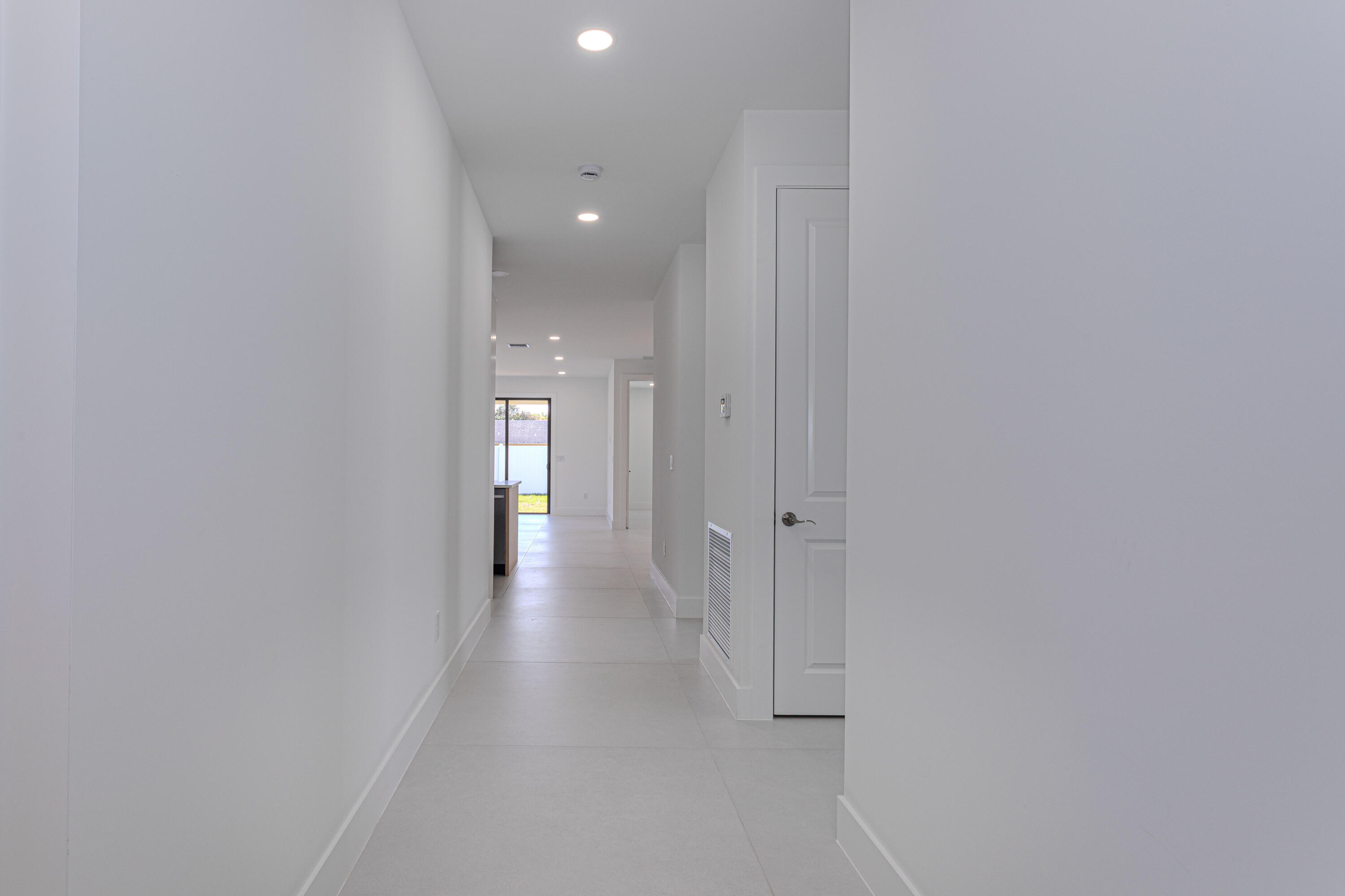 308 4th Street Jupiter, FL 33458 - Photo 16 of 51 a view of a hallway with wooden floor