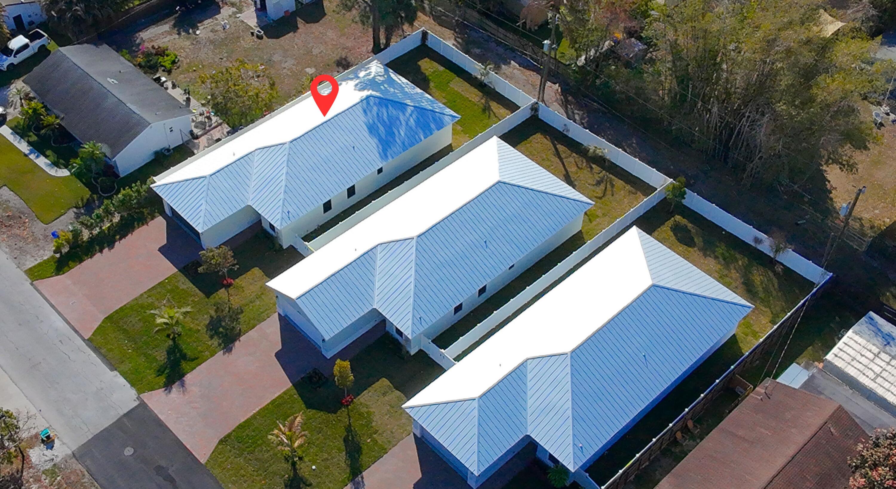 308 4th Street Jupiter, FL 33458 - Photo 21 of 51 an aerial view of a house