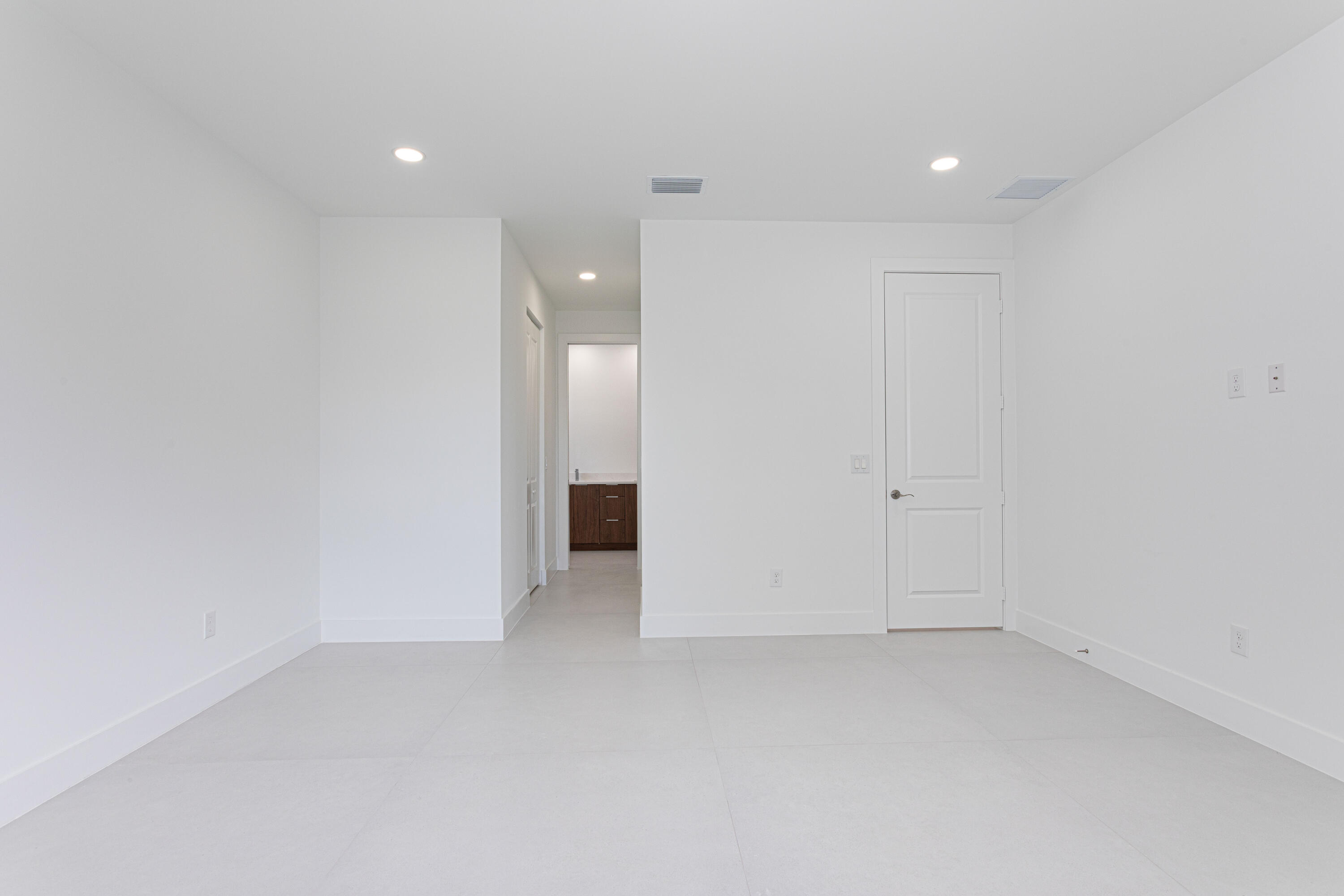 308 4th Street Jupiter, FL 33458 - Photo 31 of 51 an empty room with an entryway