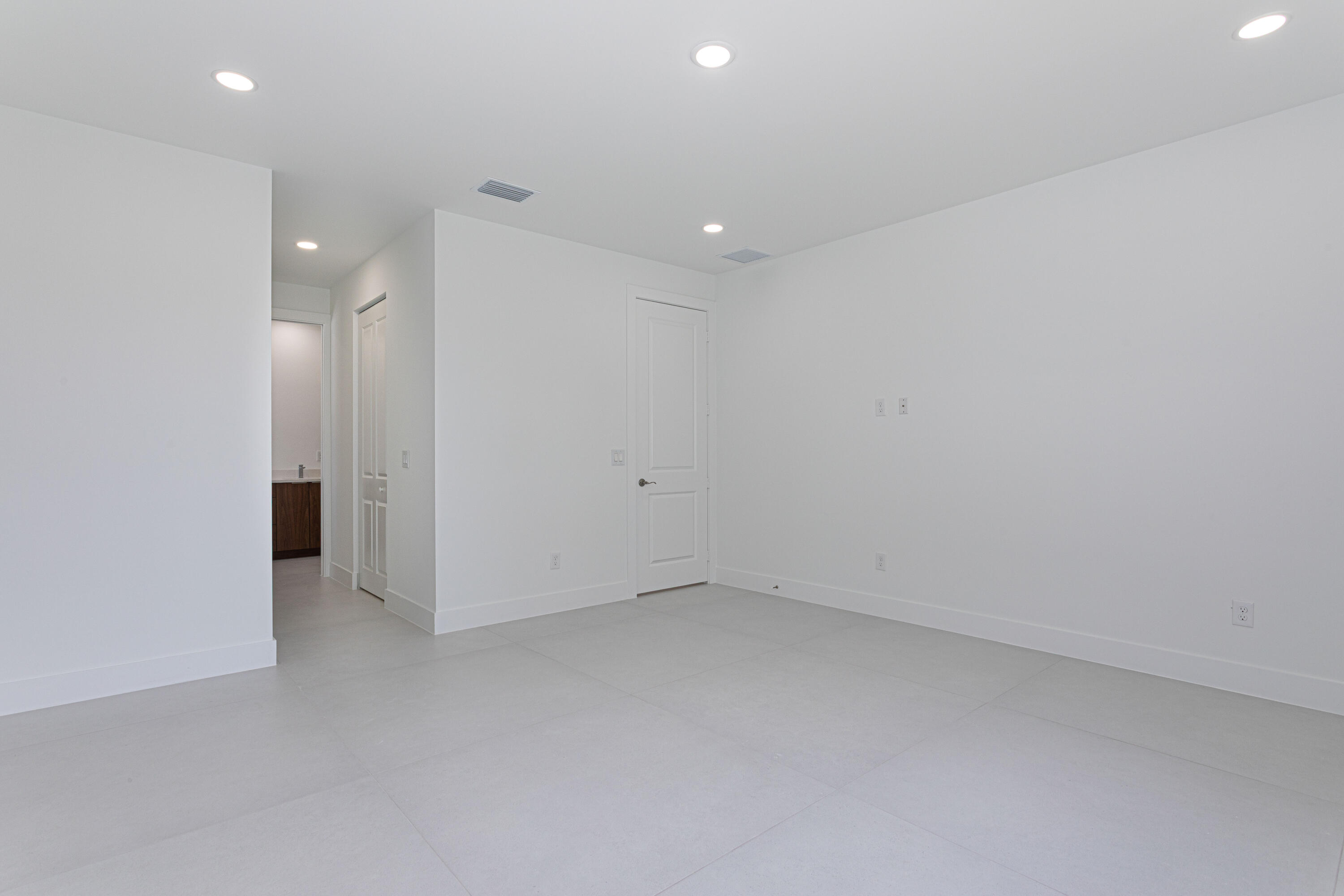 308 4th Street Jupiter, FL 33458 - Photo 33 of 51 an empty room with a empty space and windows