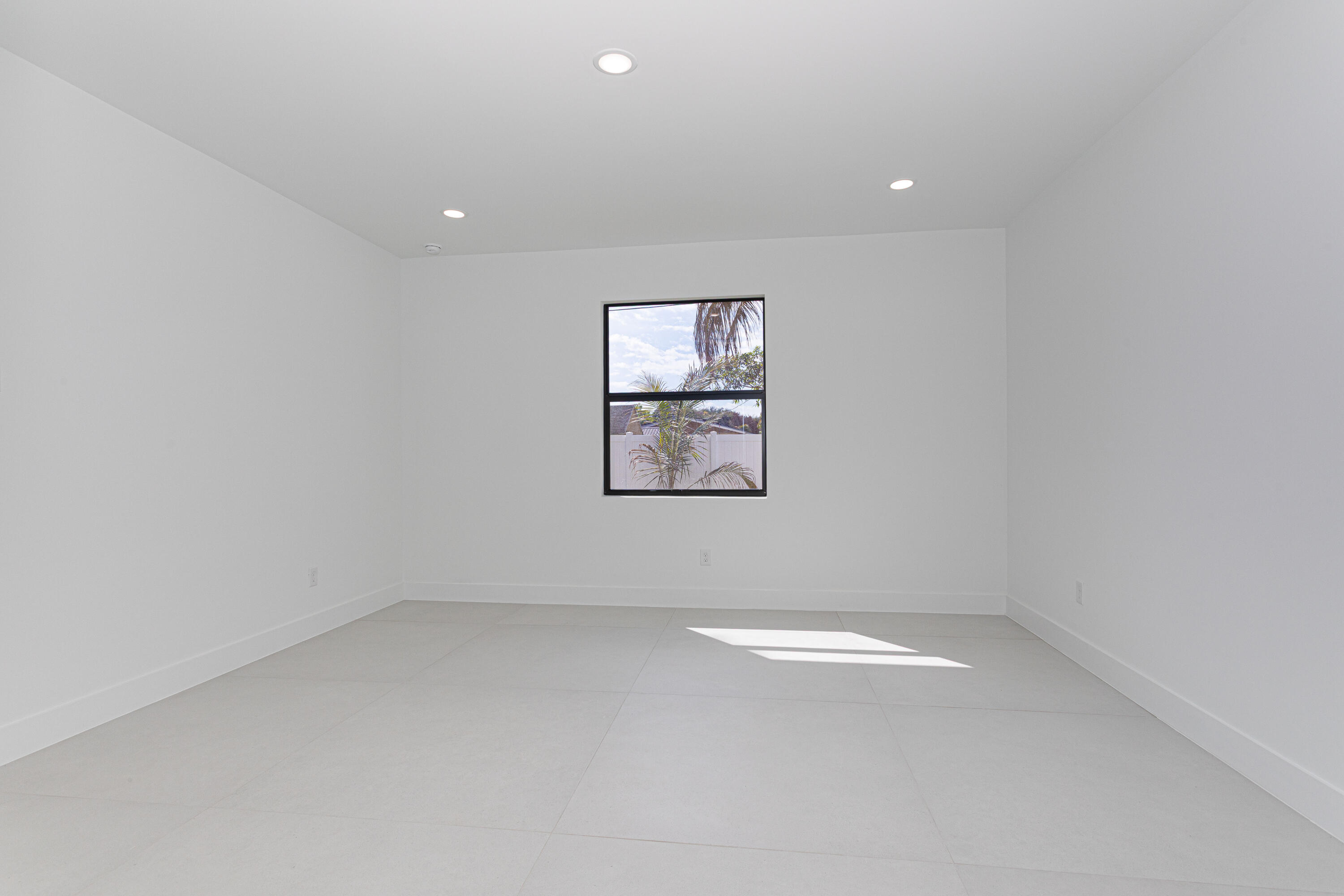 308 4th Street Jupiter, FL 33458 - Photo 36 of 51 an empty room with windows