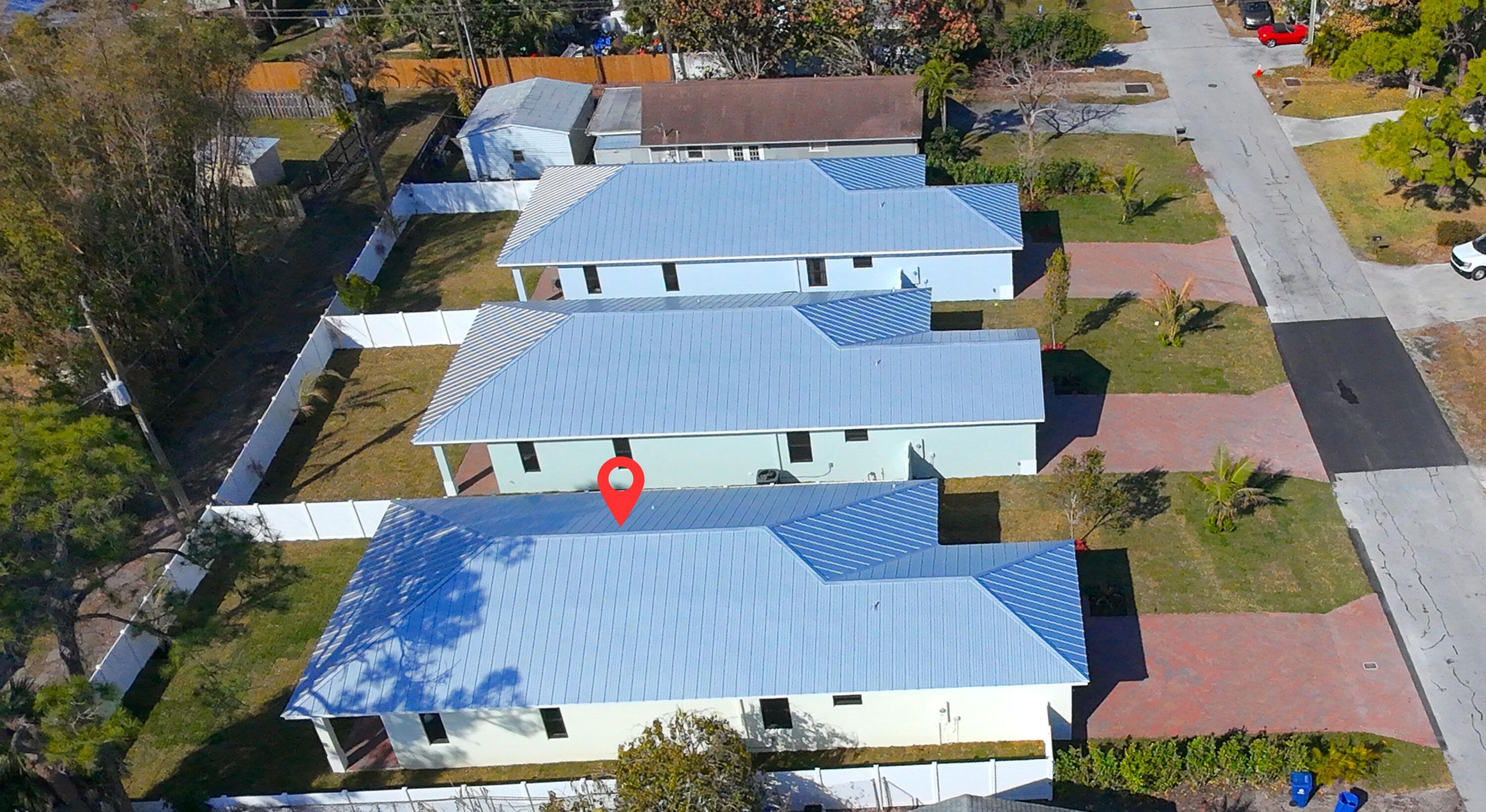 308 4th Street Jupiter, FL 33458 - Photo 40 of 51 an aerial view of houses with yard