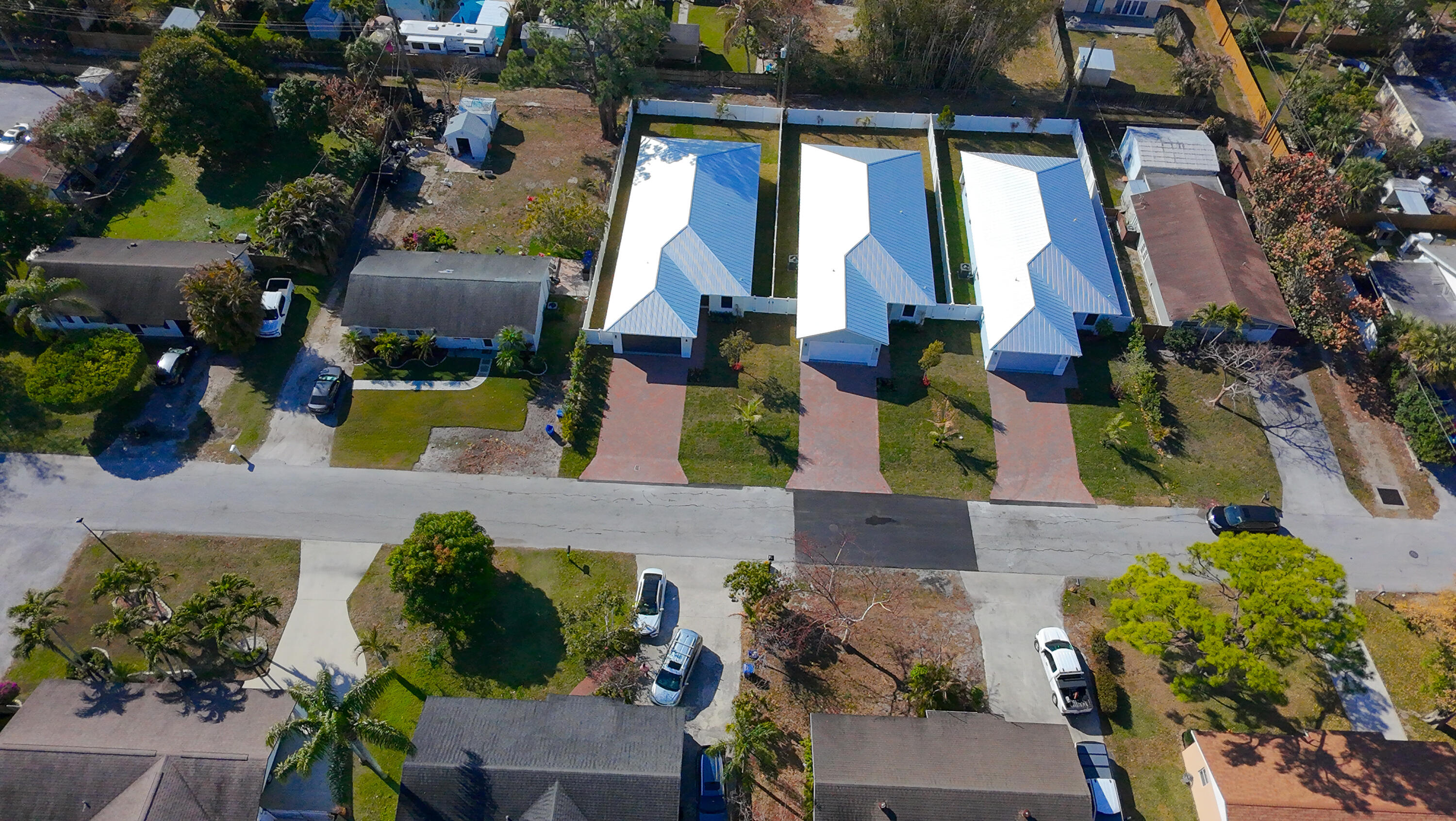 308 4th Street Jupiter, FL 33458 - Photo 43 of 51 an aerial view of houses with yard