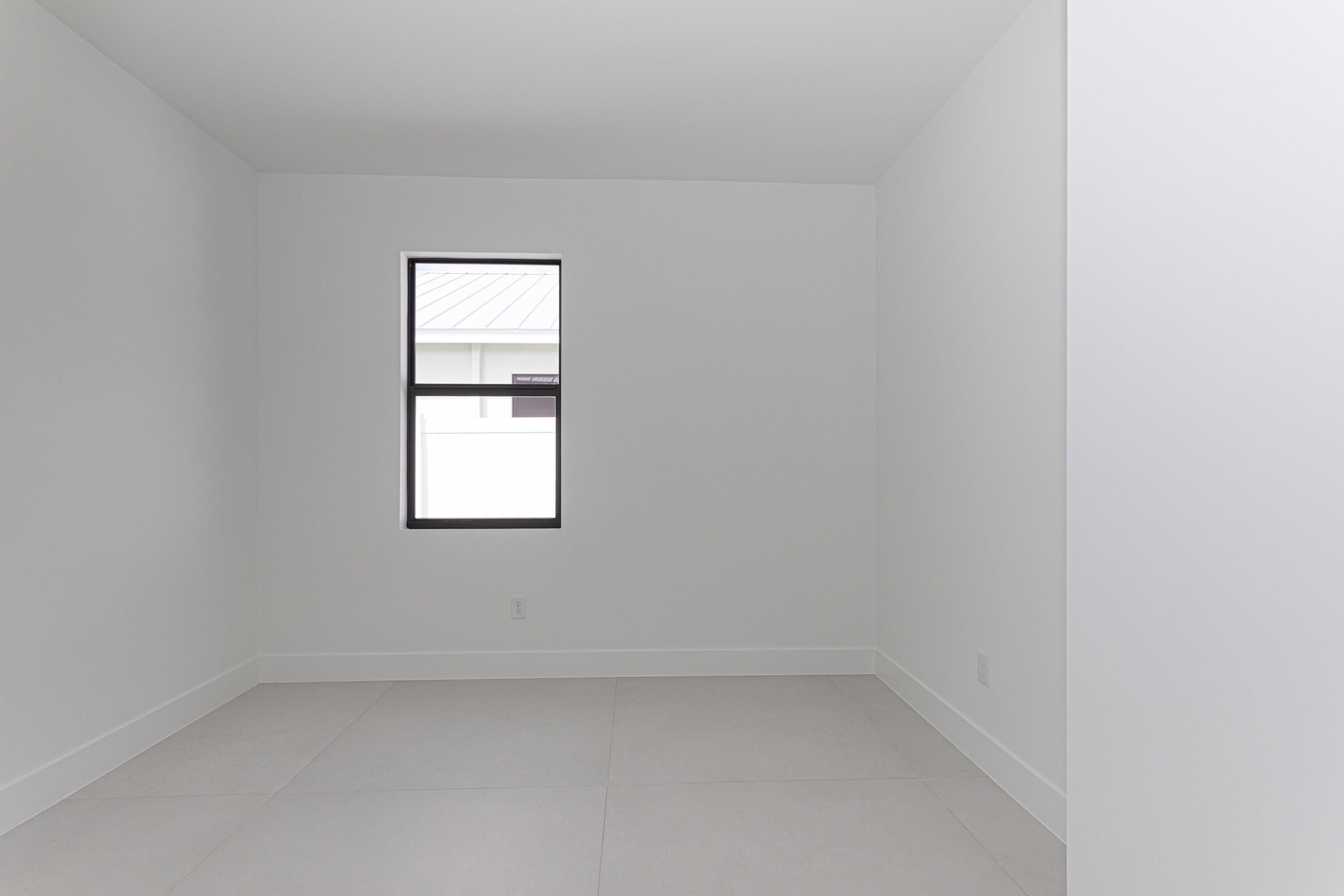 308 4th Street Jupiter, FL 33458 - Photo 48 of 51 an empty room with a window