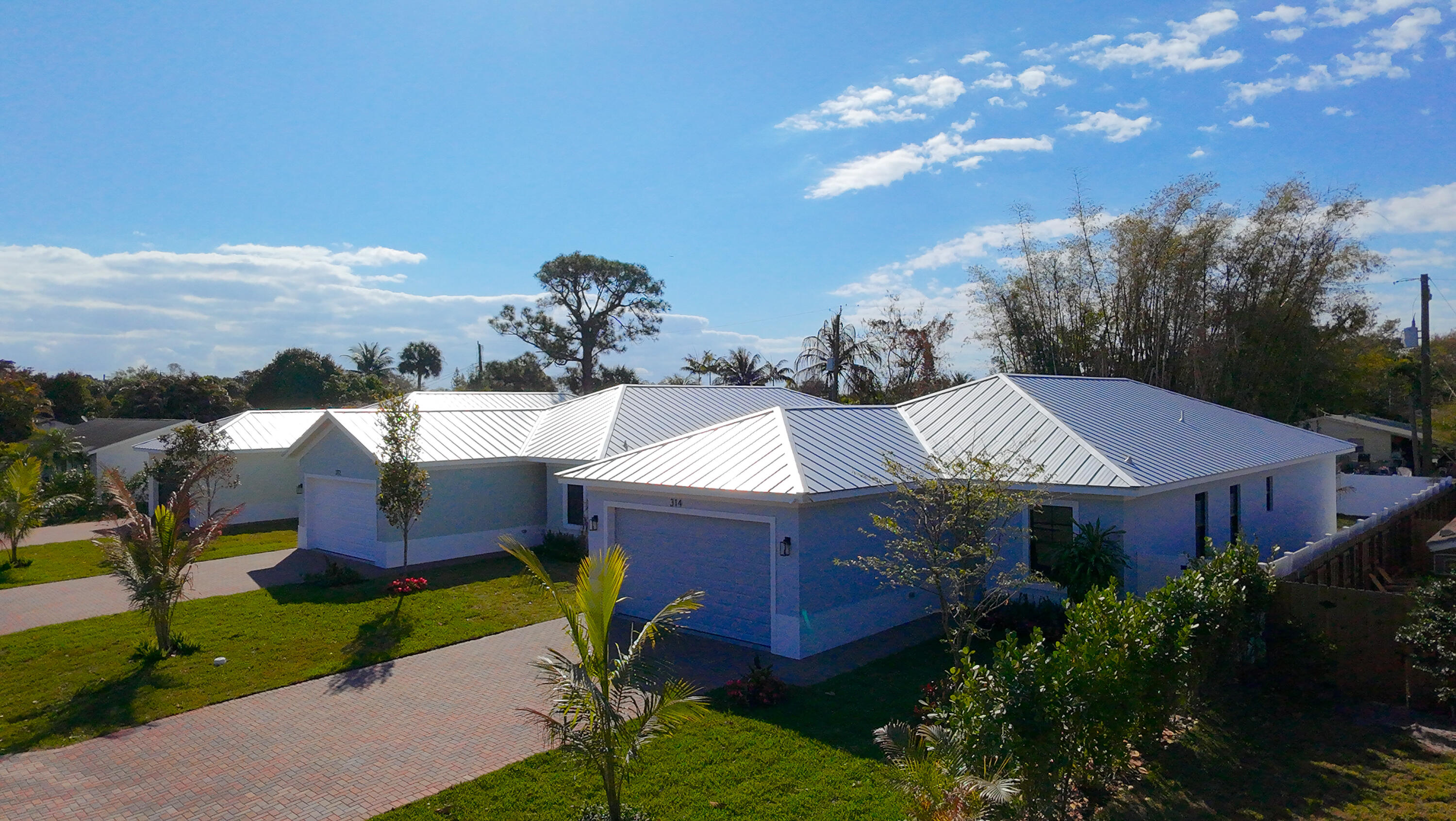 308 4th Street Jupiter, FL 33458 - Photo 5 of 51 a aerial view of a house with garden space and street view