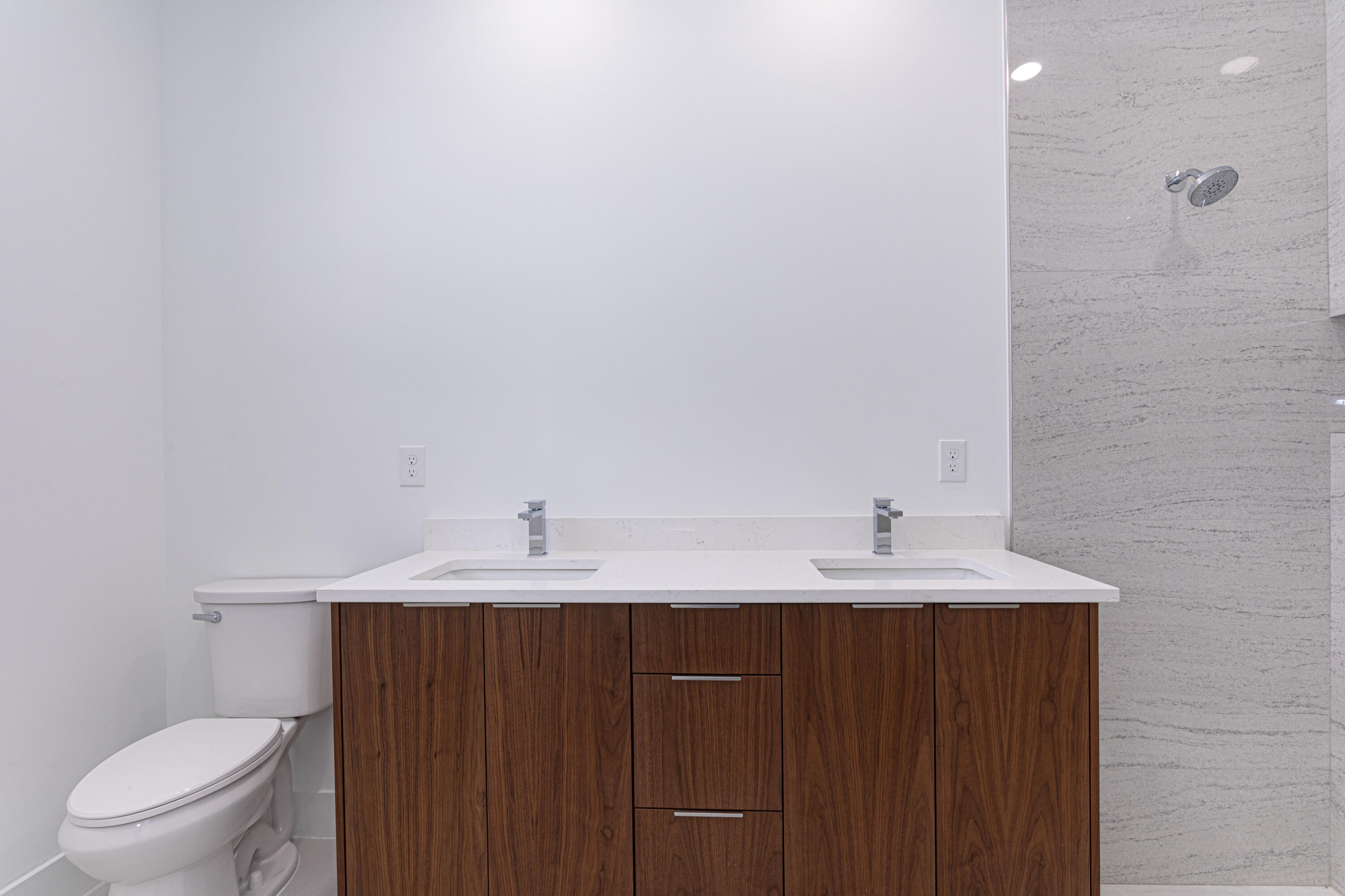 308 4th Street Jupiter, FL 33458 - Photo 51 of 51 a bathroom with a sink and a toilet