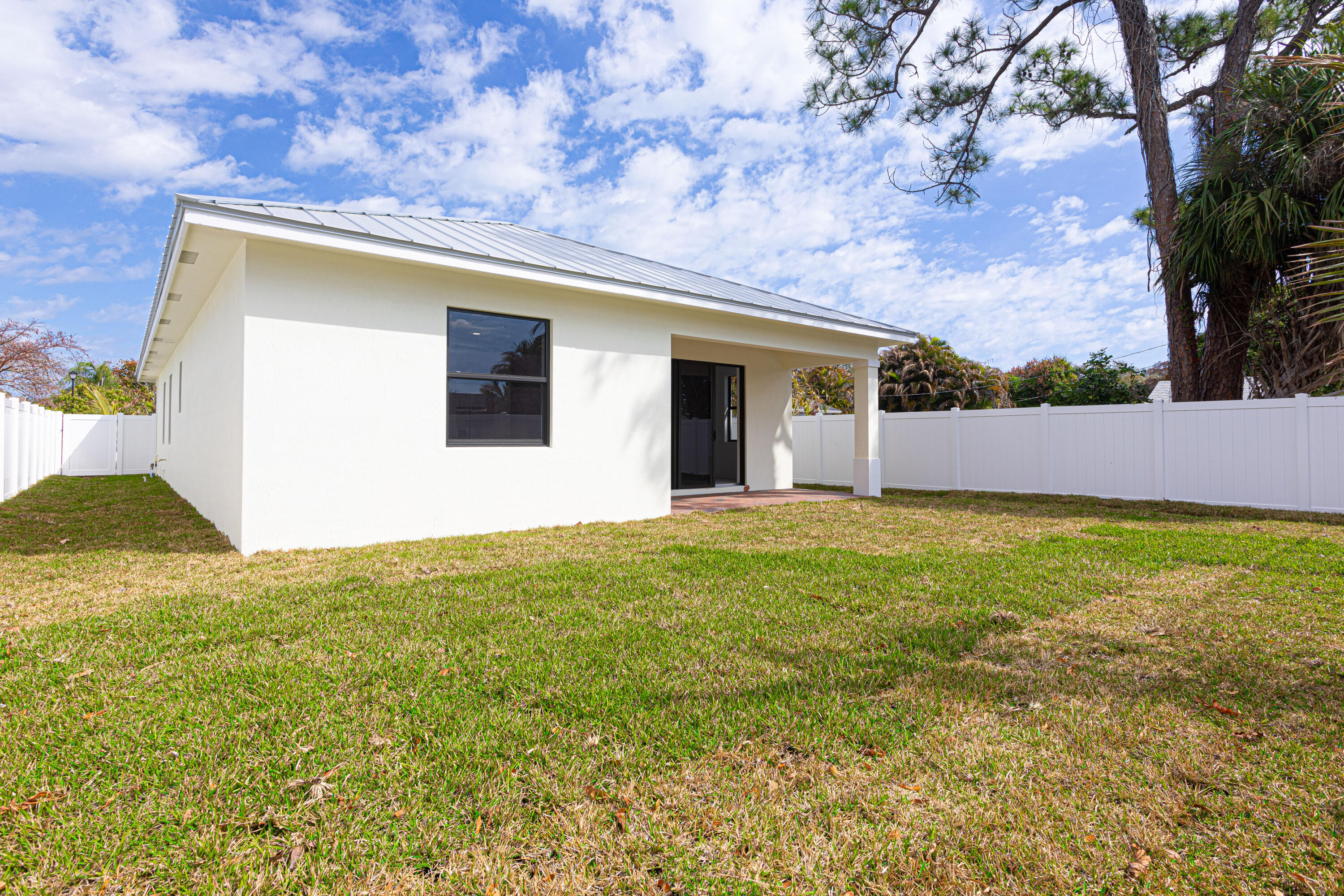 308 4th Street Jupiter, FL 33458 - Photo 6 of 51 a view of an outdoor space and yard