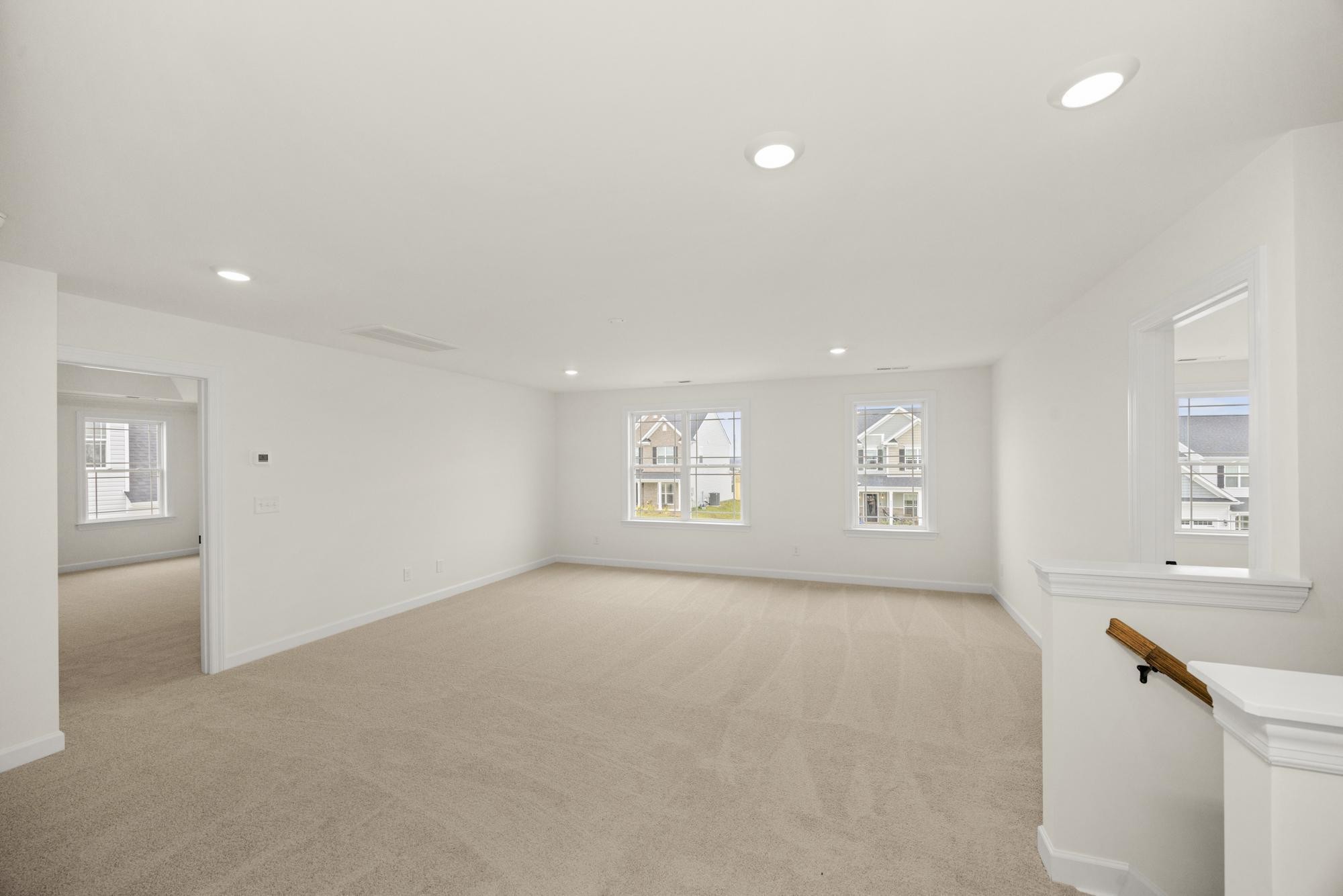 4002 Rampart Way Spring Hill Spring Hill, TN 37174 - Photo 24 of 42 an empty room with a window and a kitchen
