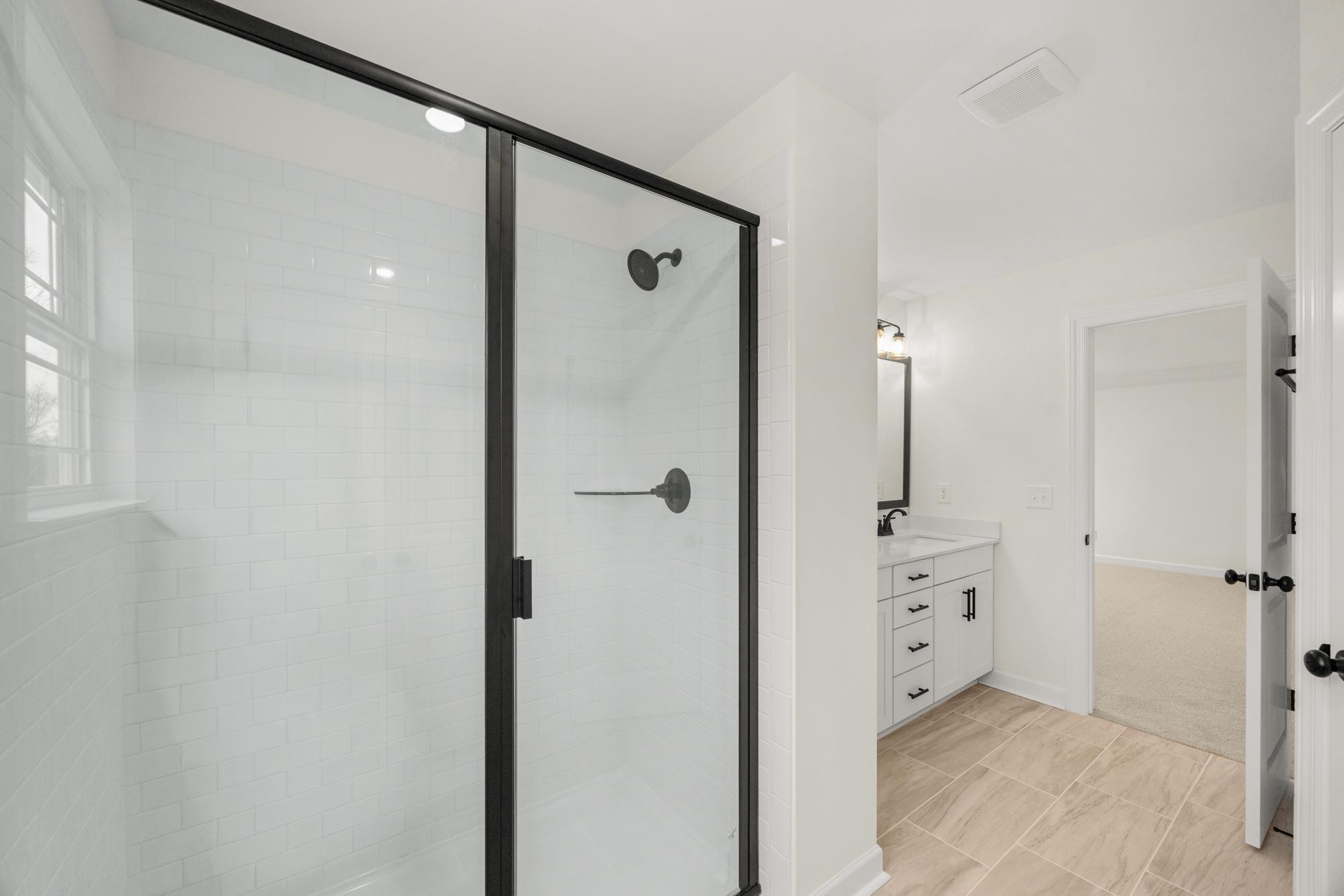 4002 Rampart Way Spring Hill Spring Hill, TN 37174 - Photo 38 of 42 a bathroom with a shower