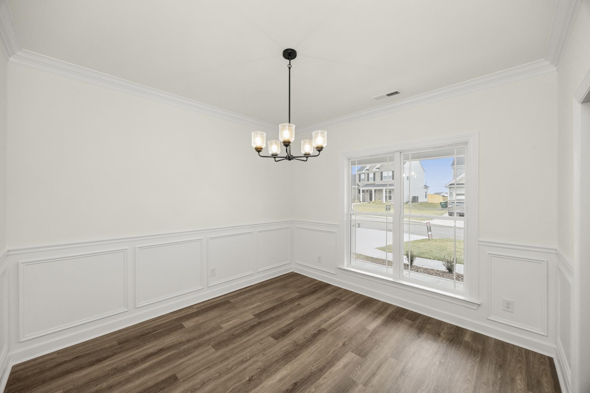 4002 Rampart Way Spring Hill Spring Hill, TN 37174 - Photo 6 of 42 a view of a room with wooden floor chandelier and window