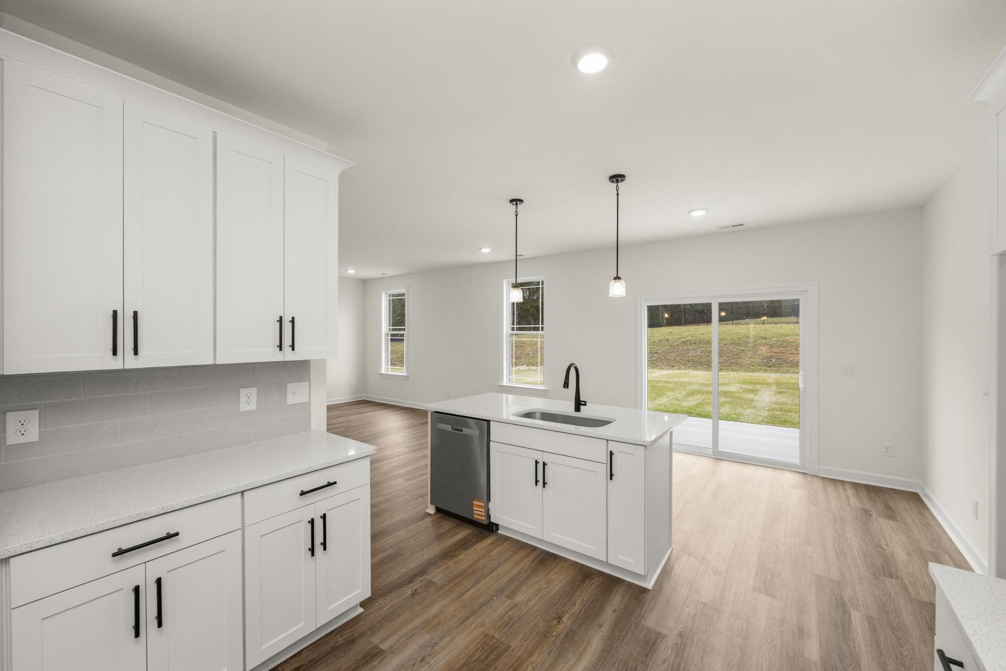 4002 Rampart Way Spring Hill Spring Hill, TN 37174 - Photo 9 of 42 a kitchen with a sink a window and cabinets