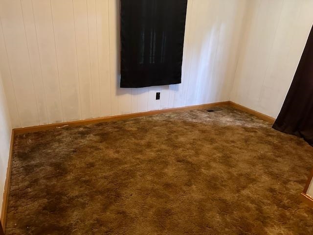 420 G B Plunk Road Selmer, TN 38375 - Photo 16 of 26 Empty room with carpet flooring