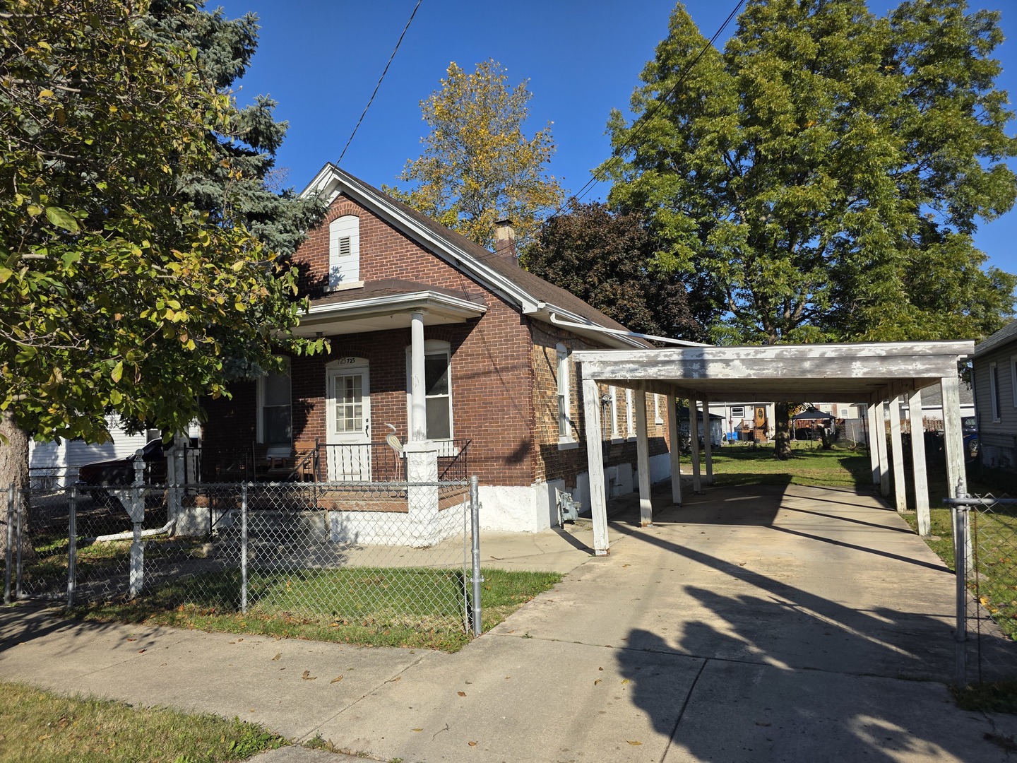 725 Chase Avenue Joliet, IL 60432 - Photo 2 of 15 a view of a house with a patio