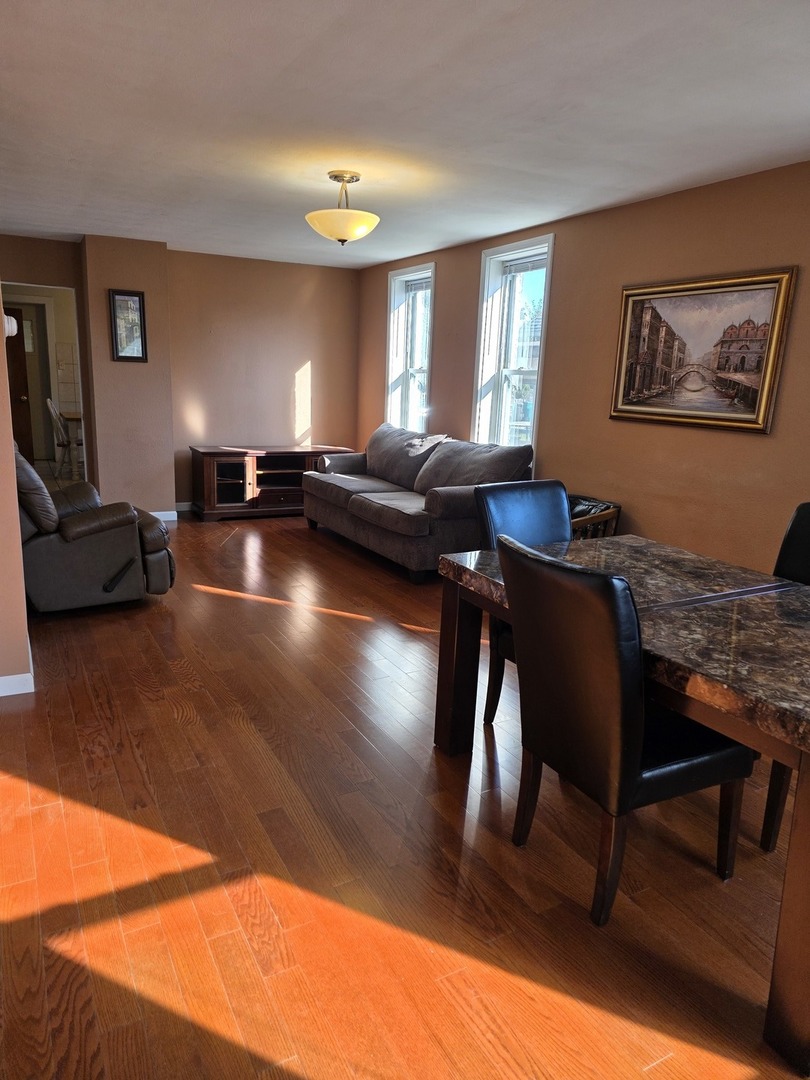 725 Chase Avenue Joliet, IL 60432 - Photo 3 of 15 a living room with furniture and a pool table
