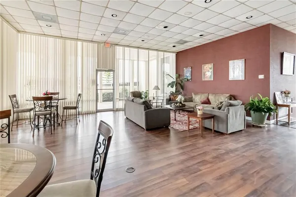 a sign board with street view