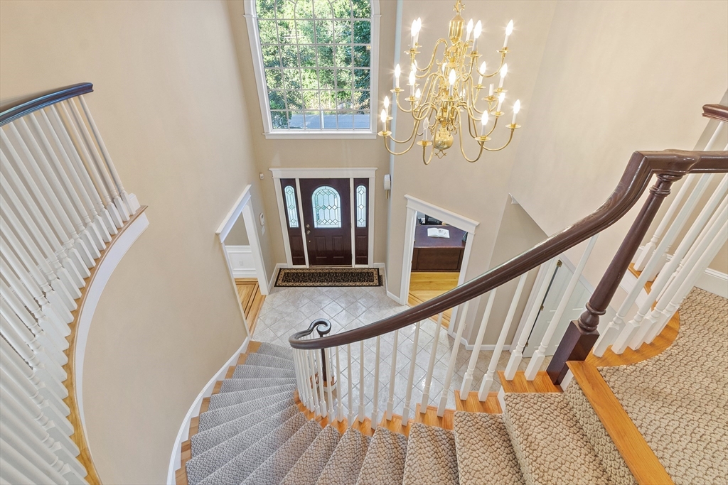 117 Hidden Road Andover, MA 01810 - Photo 8 of 42 a view of entryway with wooden floor
