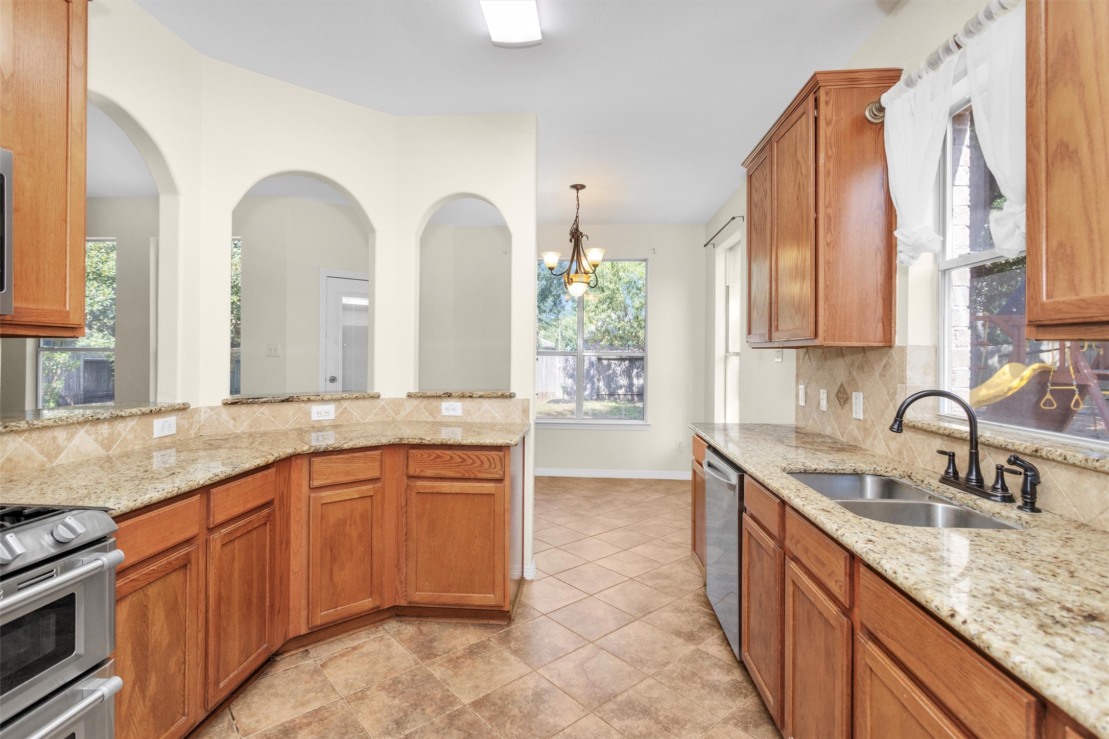 2 Lulach Circle Conroe, TX 77301 - Photo 17 of 30 Kitchen open to family room