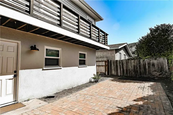a view of backyard with furniture