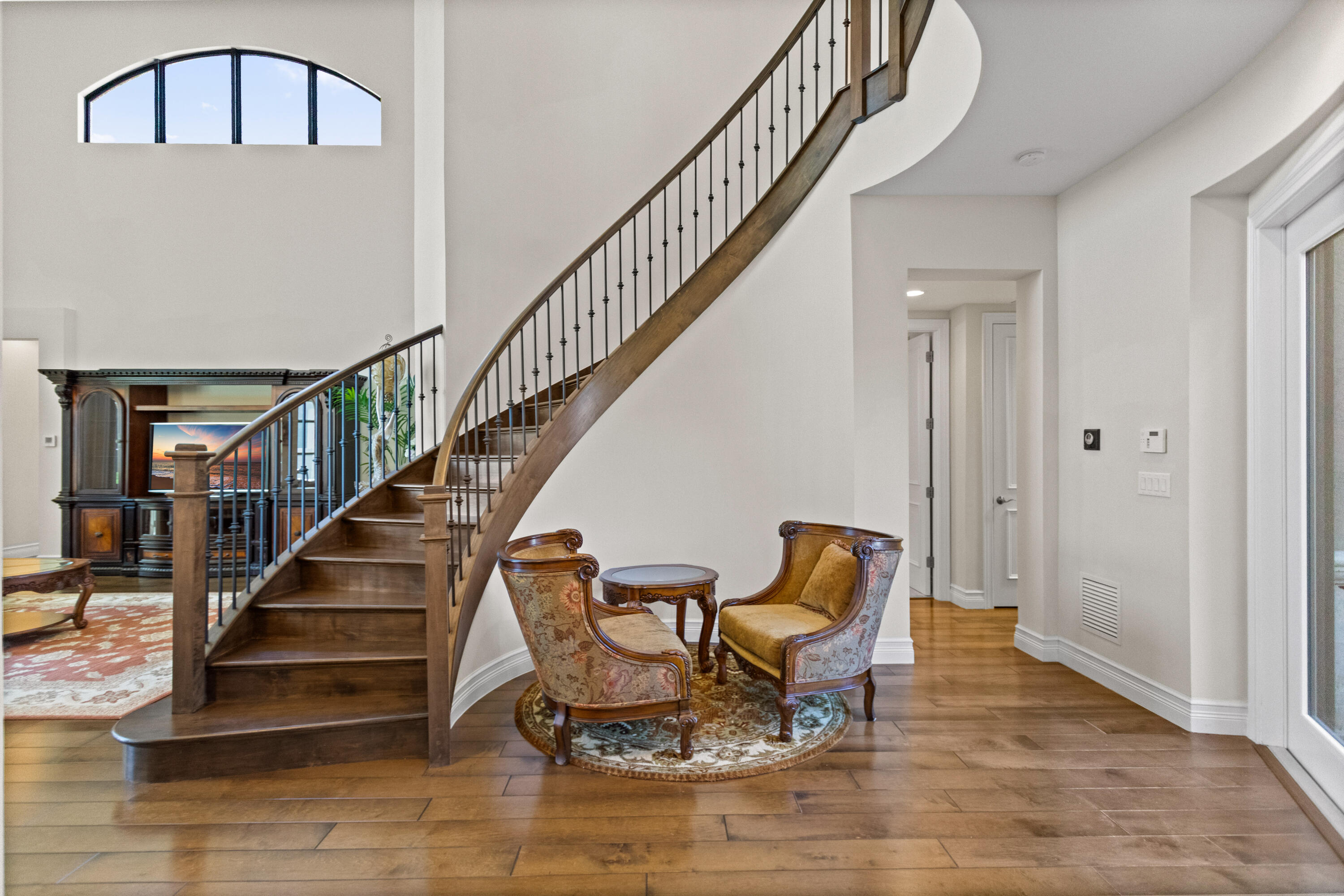 16743 Picardy Way Delray Beach, FL 33446 - Photo 17 of 79 a view of entryway and hall with wooden floor